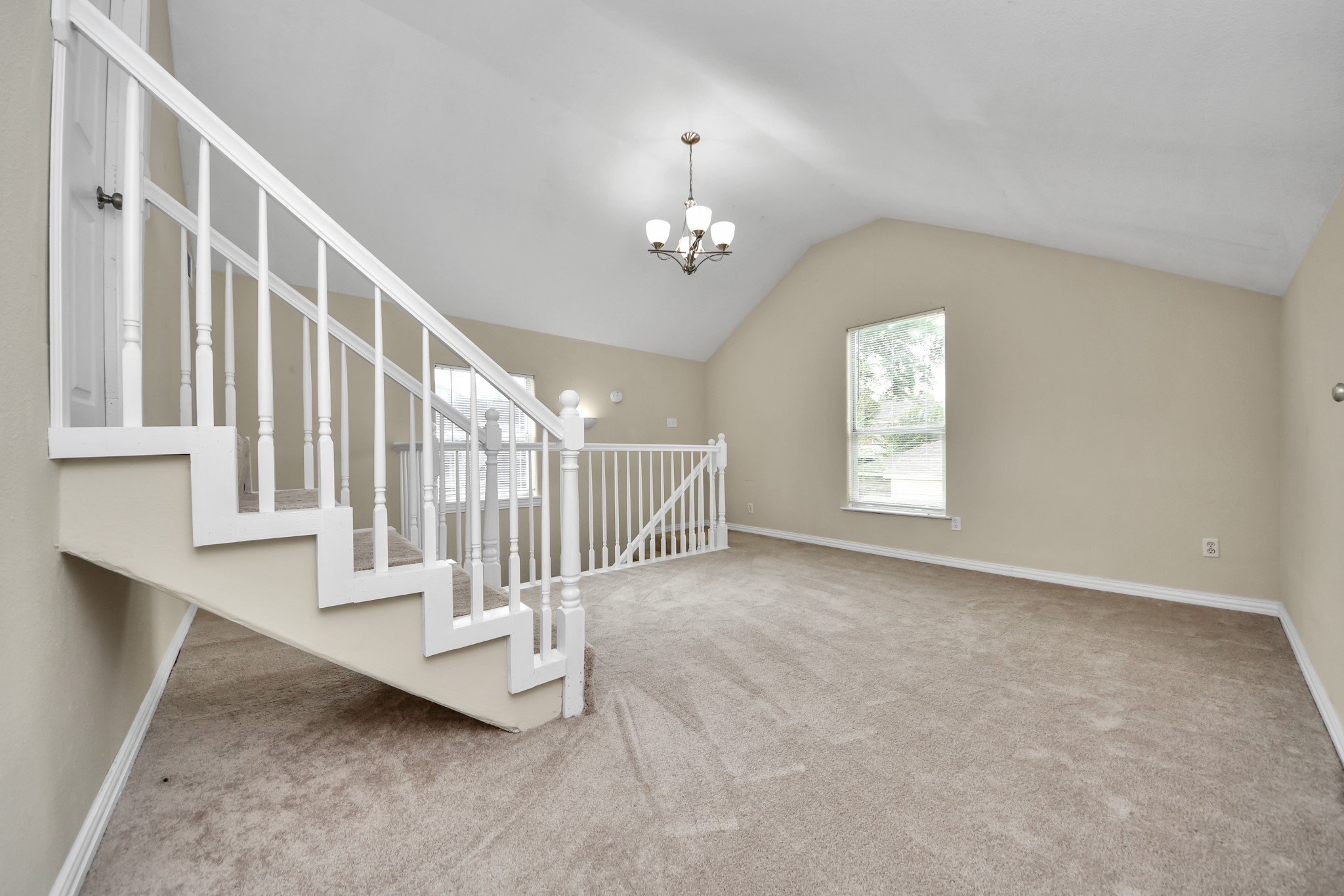 6833 Stonehaven Way Houston, TX 77085 - Photo 18 of 23 en view interior of a house with stairs