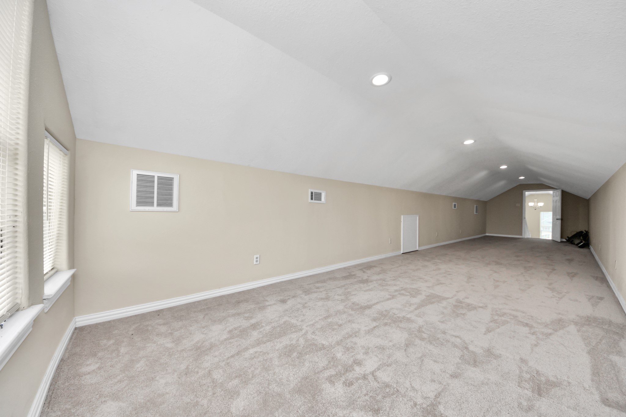 6833 Stonehaven Way Houston, TX 77085 - Photo 21 of 23 a view of an empty room with a window