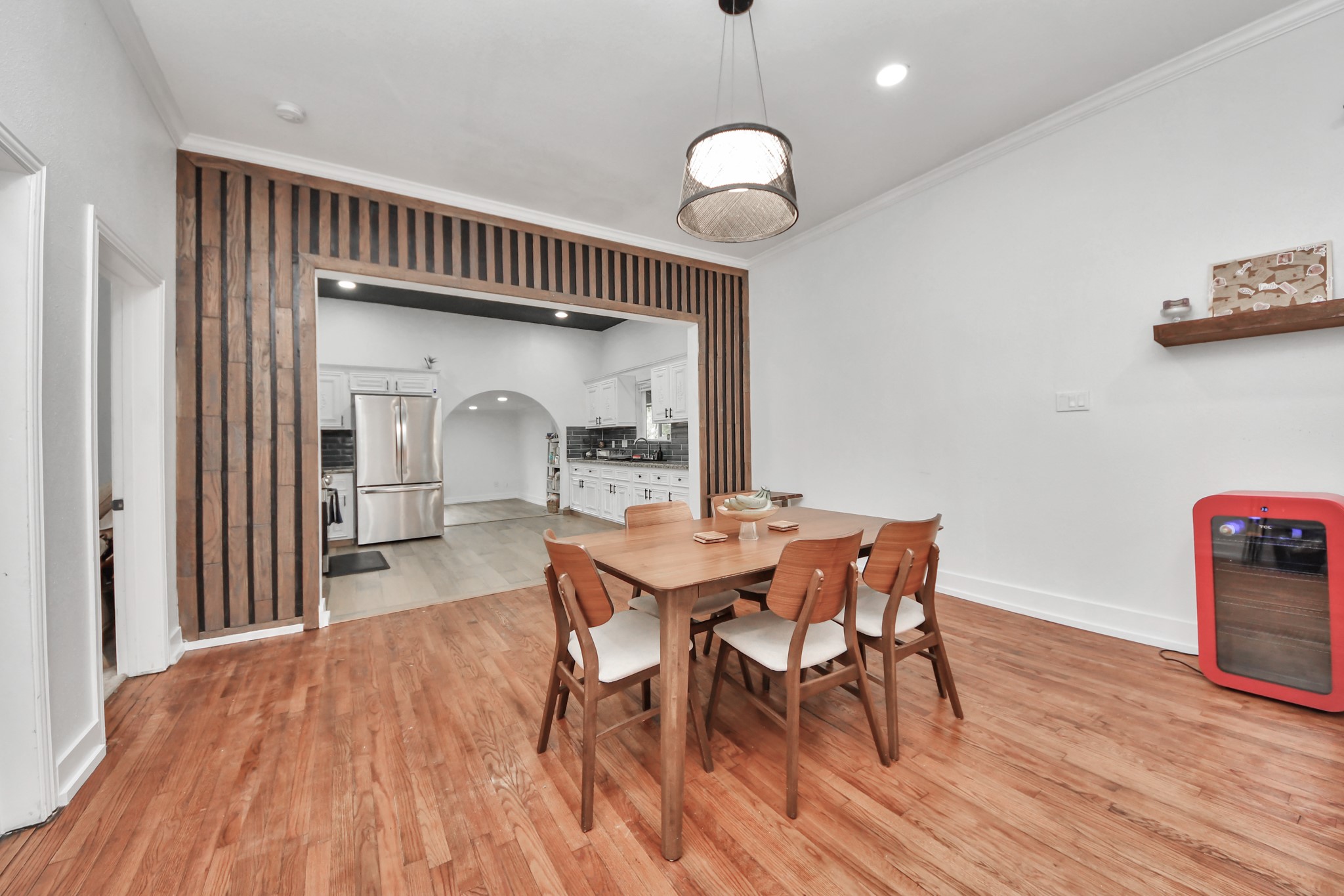 6833 Stonehaven Way Houston, TX 77085 - Photo 4 of 23 a view of a dining room with furniture and wooden floor