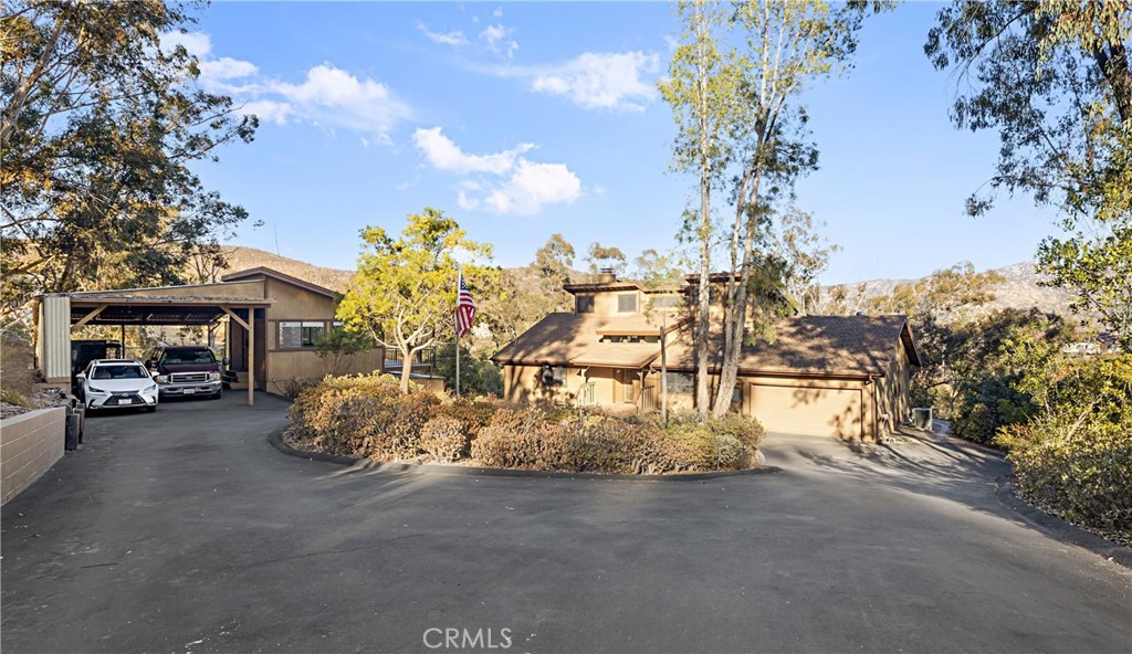 11879 Rocoso Road Lakeside, CA 92040 - Photo 3 of 25 a view of a street with cars