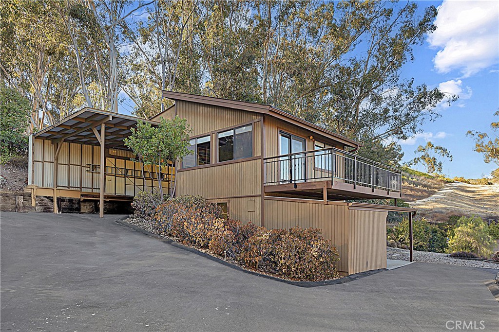 11879 Rocoso Road Lakeside, CA 92040 - Photo 5 of 25 a view of a house with a yard