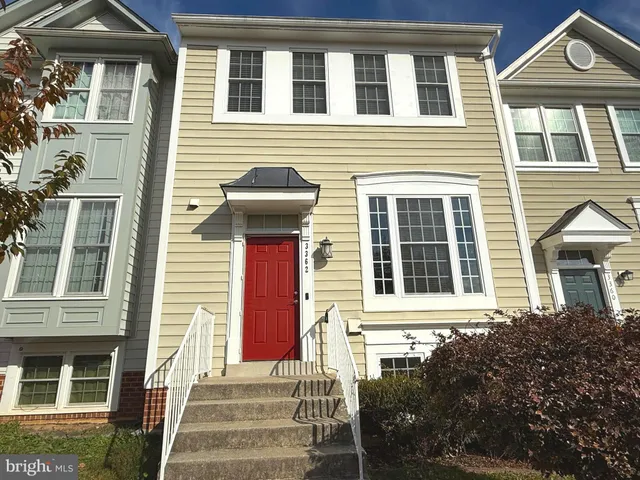 a front view of a house with a outdoor space