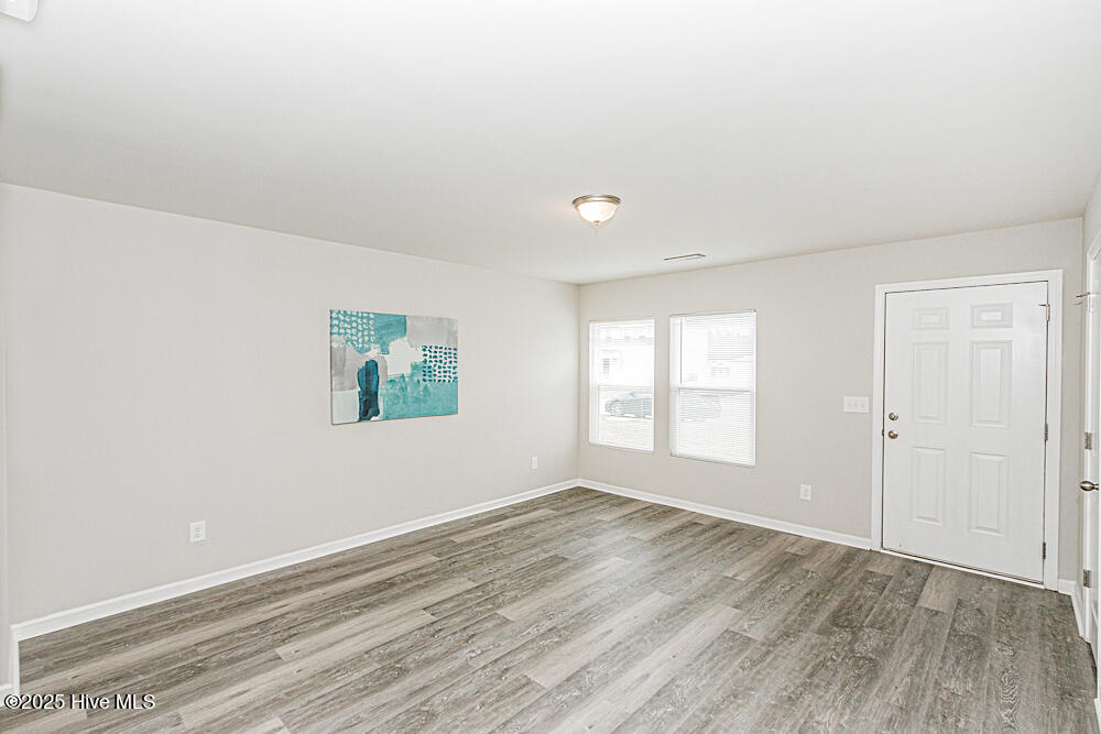 1241 Fescue Road Rocky Mount, NC 27801 - Photo 3 of 17 New luxury vinyl plank flooring and new paint throughout!