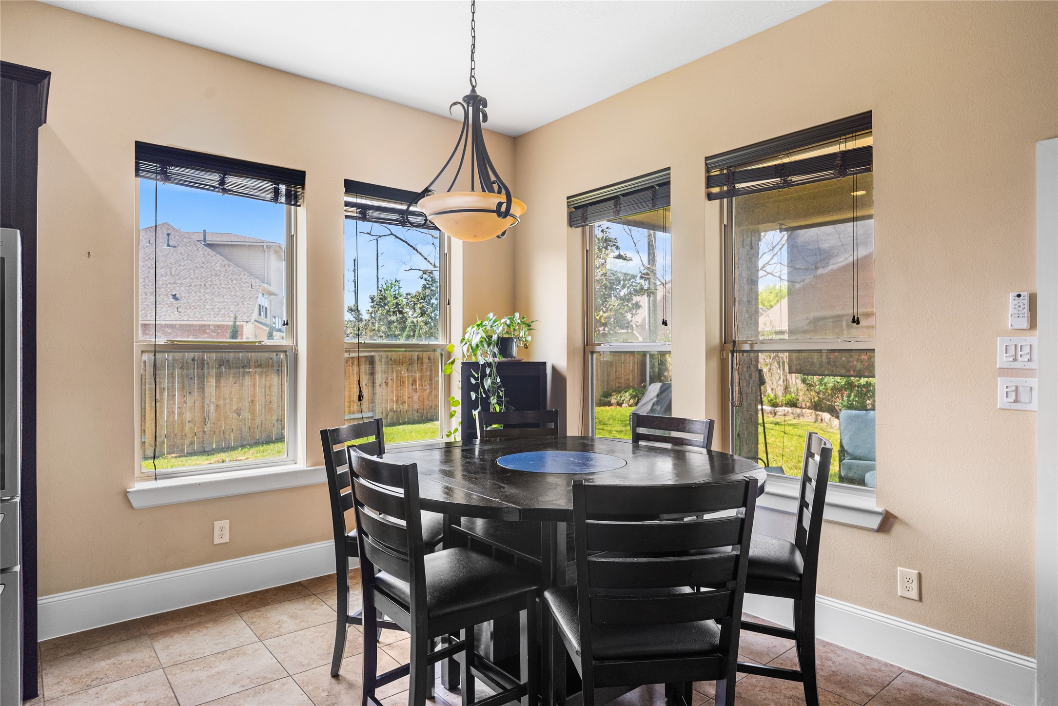 31311 Brighton Brook Lane Spring, TX 77386 - Photo 14 of 43 Light-filled breakfast area overlooking a perfectly manicured backyard, creating a peaceful start to your day.
