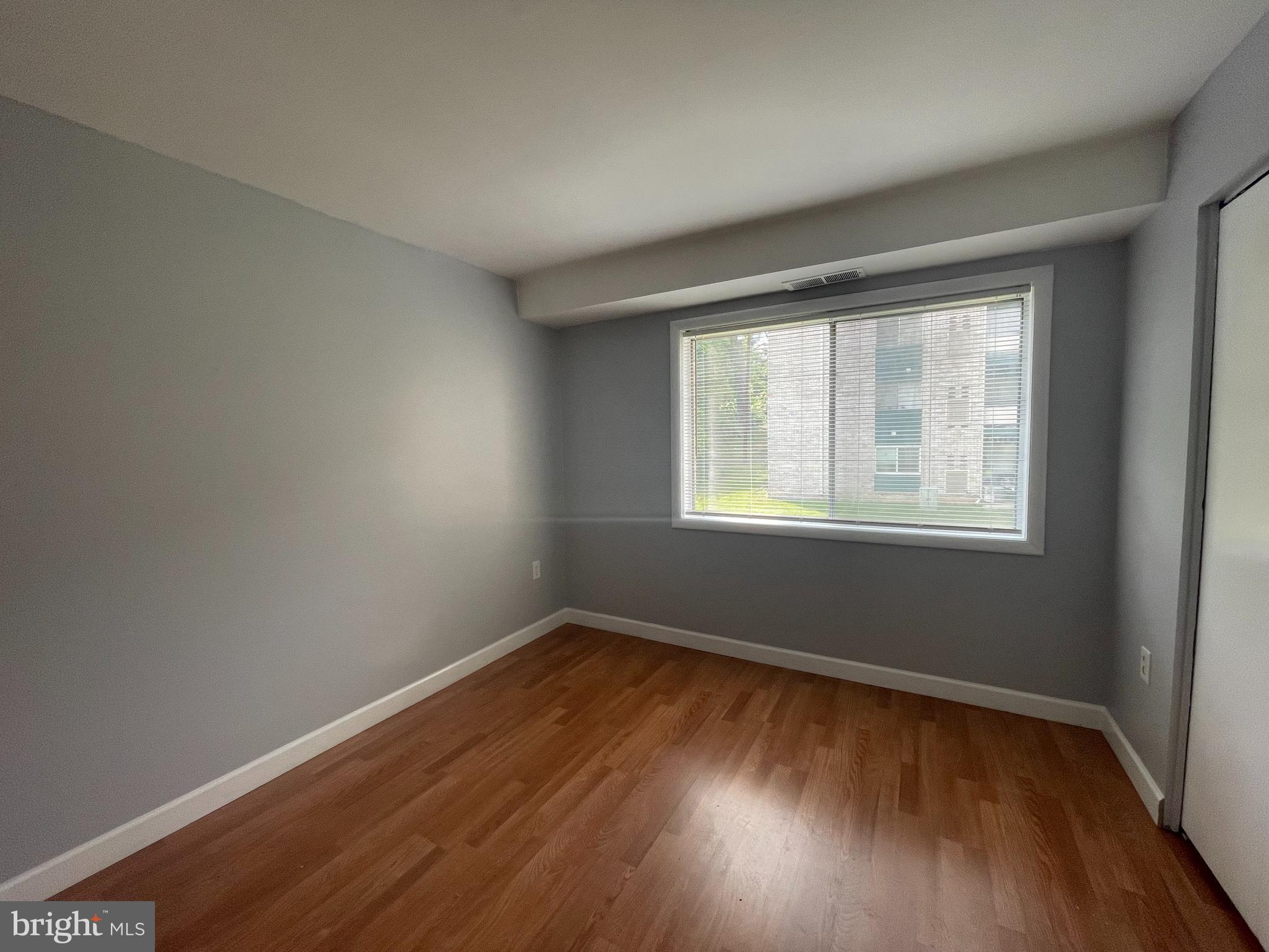 9270 Adelphi Road, Unit 2 Hyattsville, MD 20783 - Photo 11 of 16 2nd bedroom with laminate floors