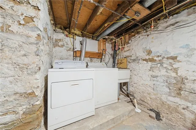 a backyard of a house with seating space