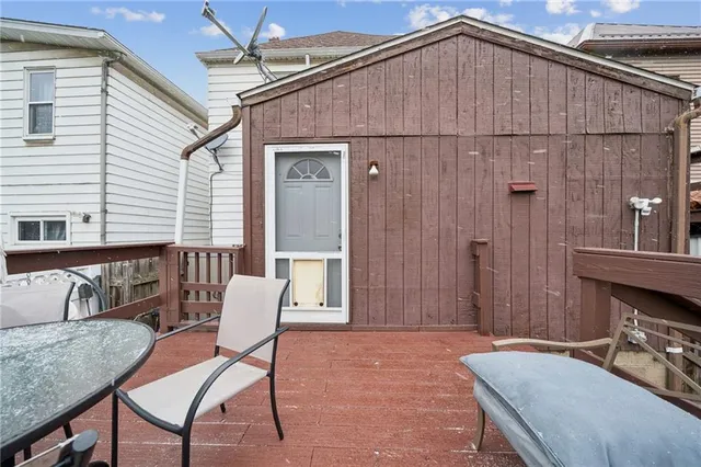 a view of a terrace with furniture and stove