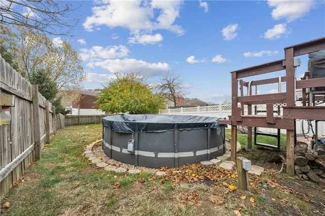a view of roof deck with furniture