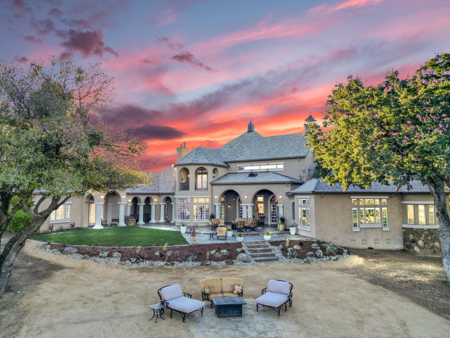 1100 Cold Springs Road Placerville, CA 95667 - Photo 58 of 97 Stately exterior featuring a multi-level design with arched windows and a stone foundation