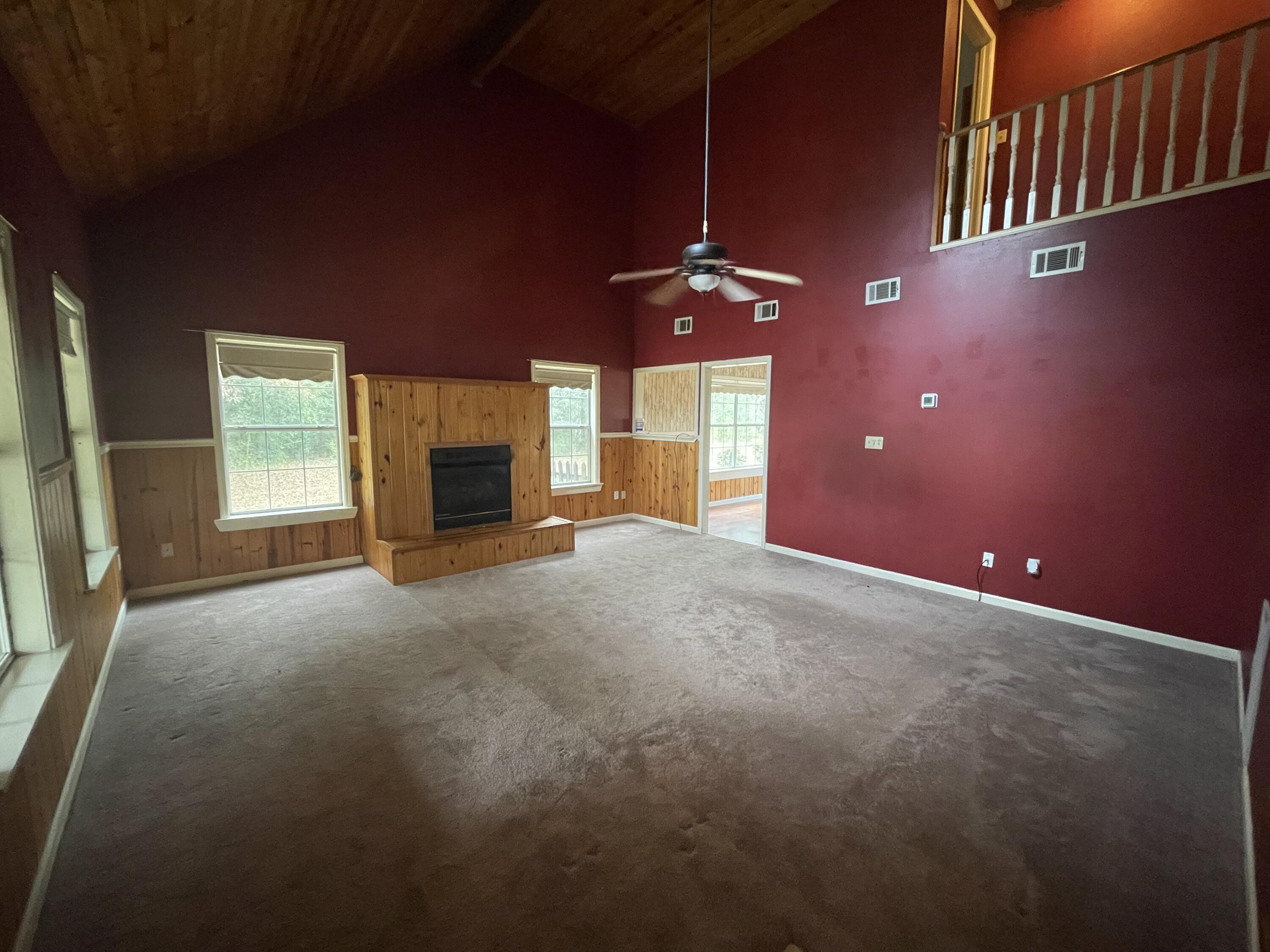 5341 Galiver Cutoff Baker, FL 32531 - Photo 6 of 13 a view of an empty room with a fireplace