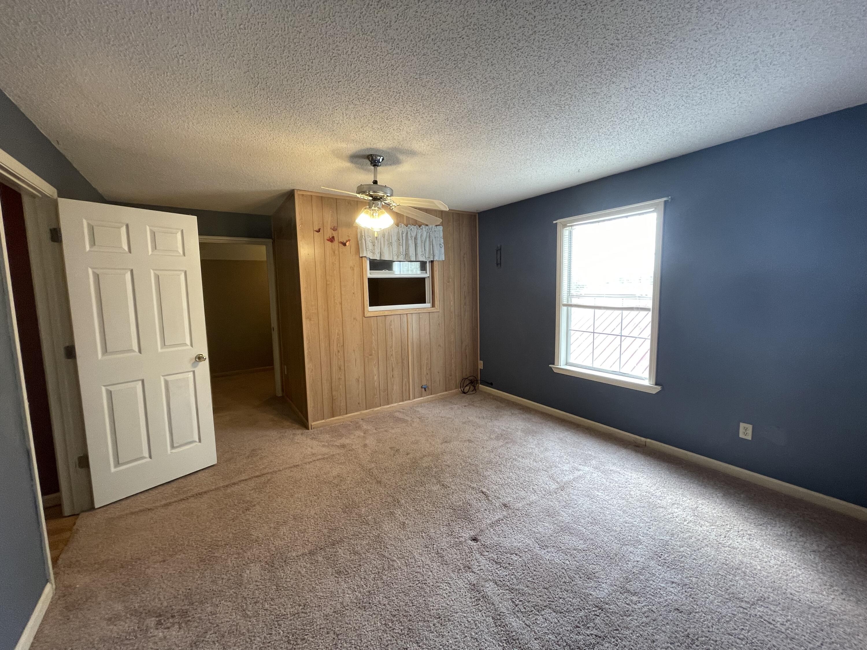 5341 Galiver Cutoff Baker, FL 32531 - Photo 10 of 13 an empty room with windows and closet