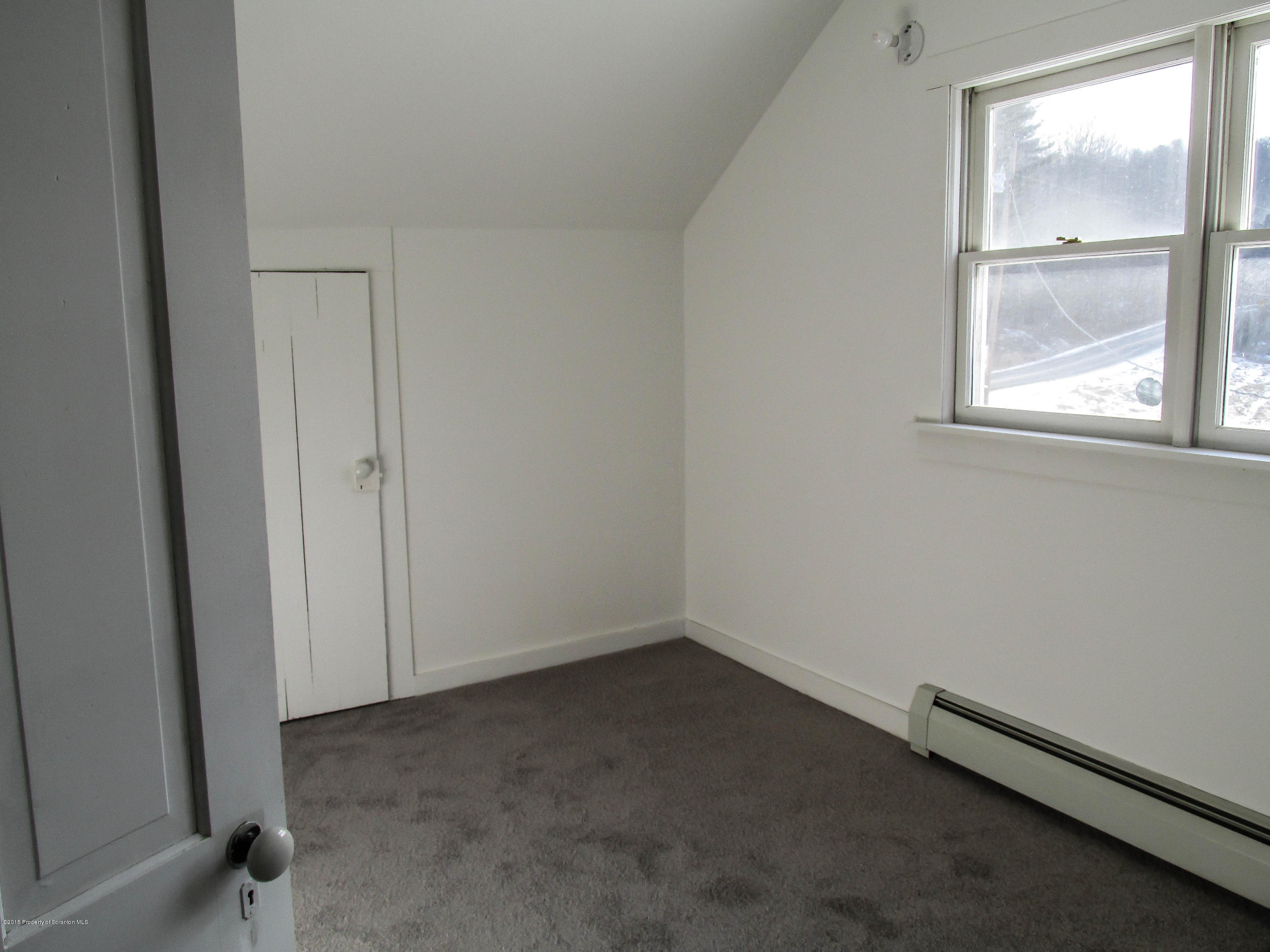 18806 Dimock To Nicholson Road Nicholson, PA 18446 - Photo 20 of 42 an empty room with a window