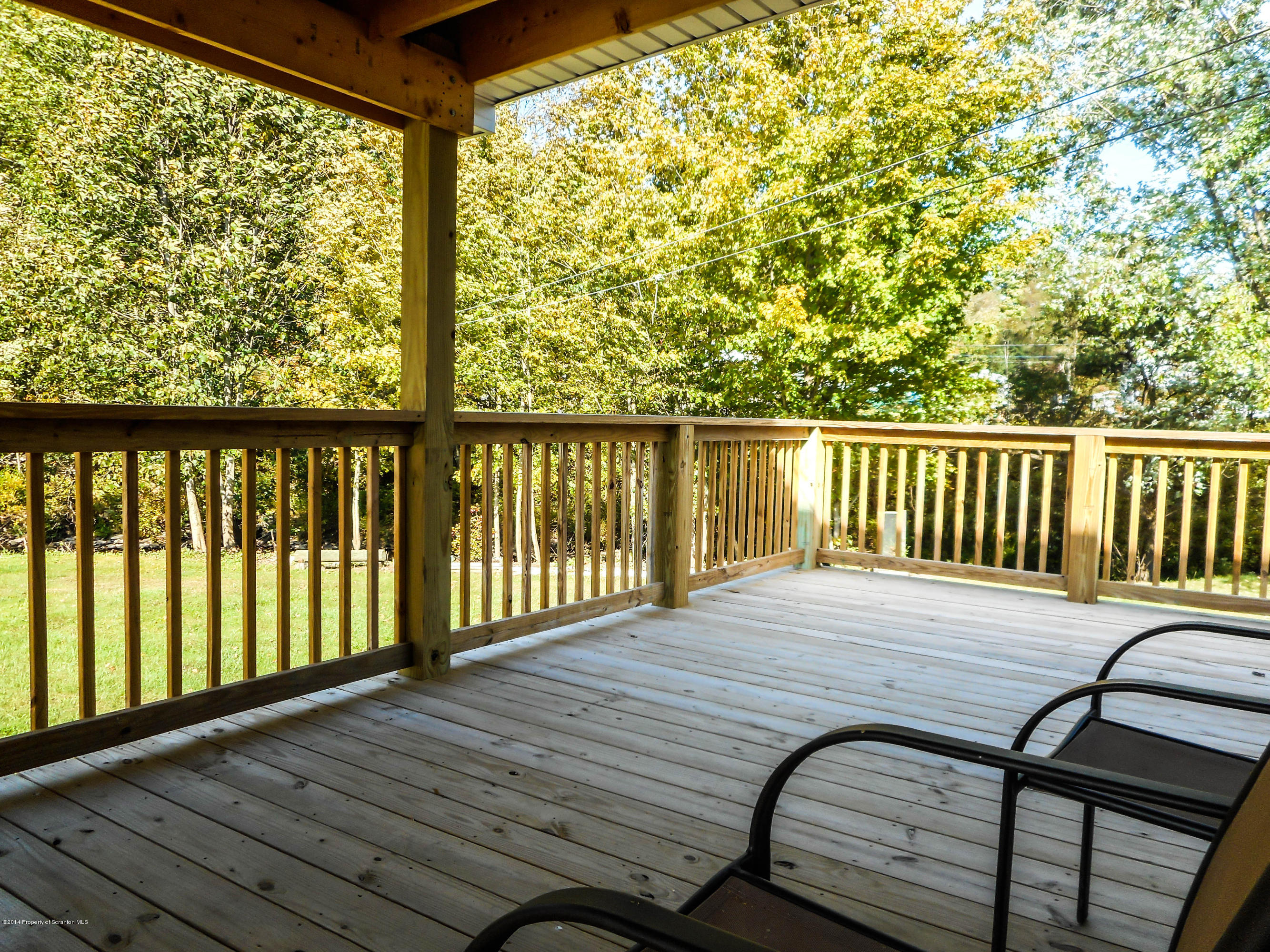 18806 Dimock To Nicholson Road Nicholson, PA 18446 - Photo 31 of 42 a view of balcony with wooden floor