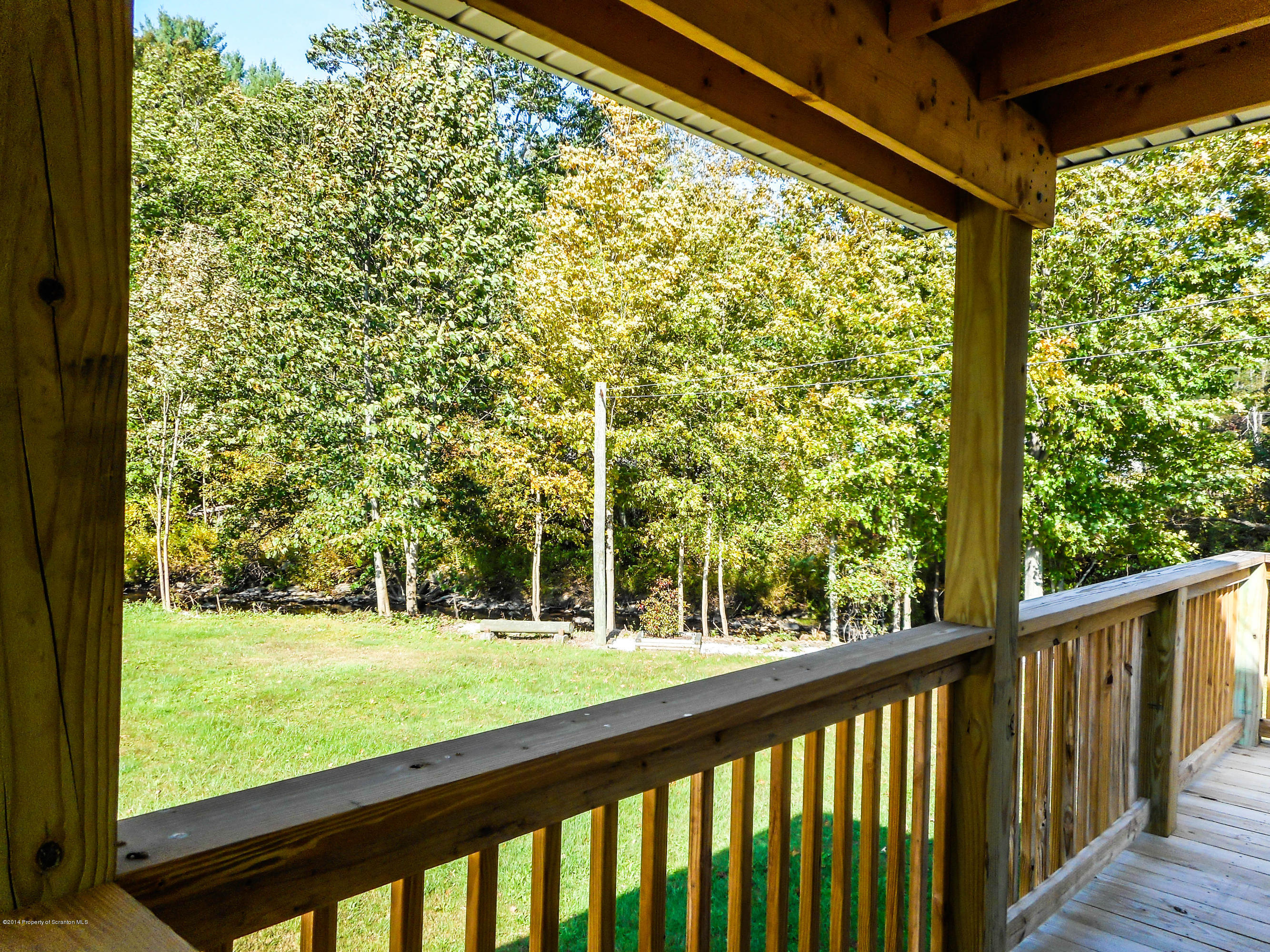 18806 Dimock To Nicholson Road Nicholson, PA 18446 - Photo 32 of 42 a view of outdoor space with deck