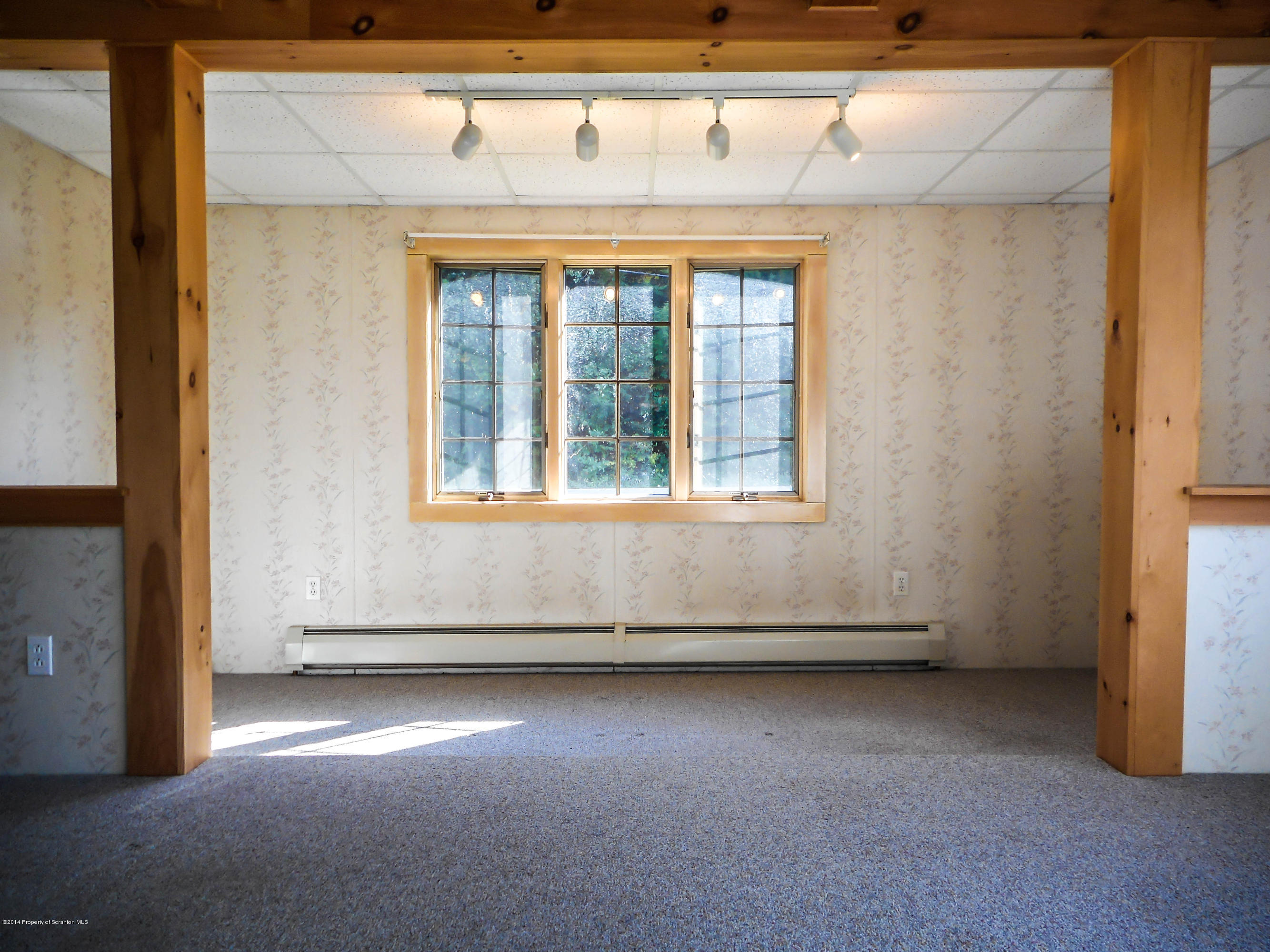 18806 Dimock To Nicholson Road Nicholson, PA 18446 - Photo 6 of 42 a view of an empty room with a window
