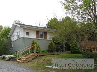 369 Wildcat Road Deep Gap, NC 28618 - Photo 1 of 1 a view of a house with a yard