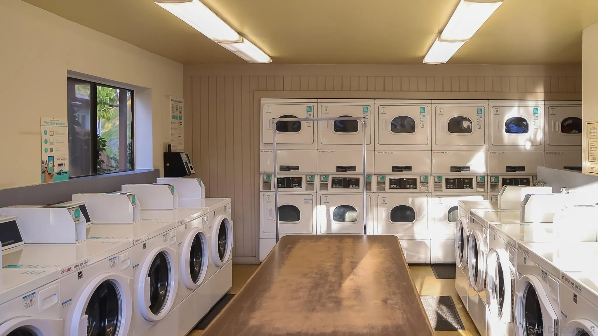 6358 Rancho Mission Road, Unit 624 San Diego, CA 92108 - Photo 23 of 23 a large white building with glass door