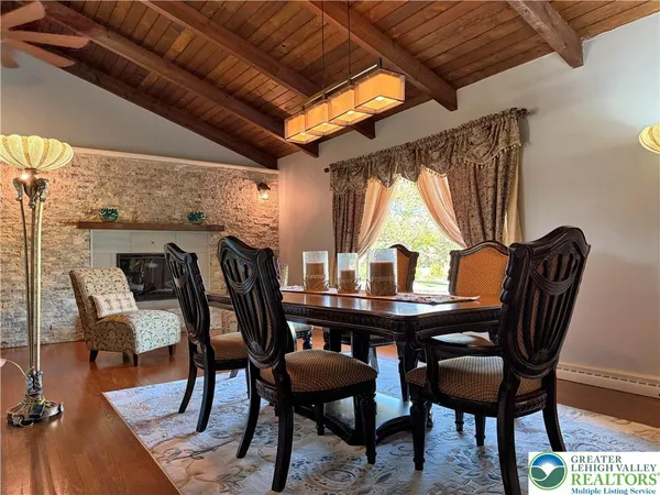 a kitchen with stainless steel appliances granite countertop sink stove top oven and cabinets