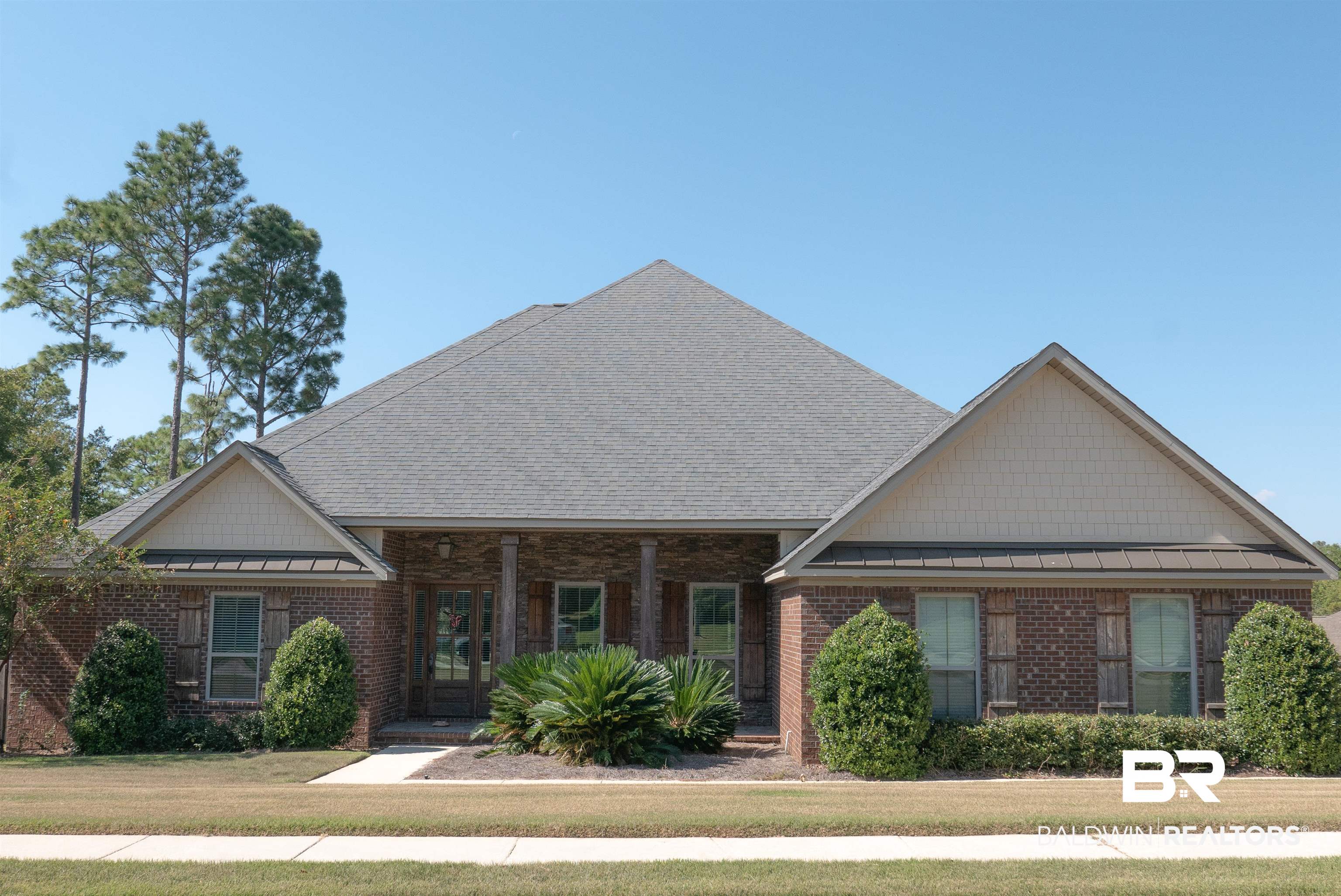 6684 Garrison Drive Daphne, AL 36527 - Photo 35 of 35 View of front of house featuring a front yard