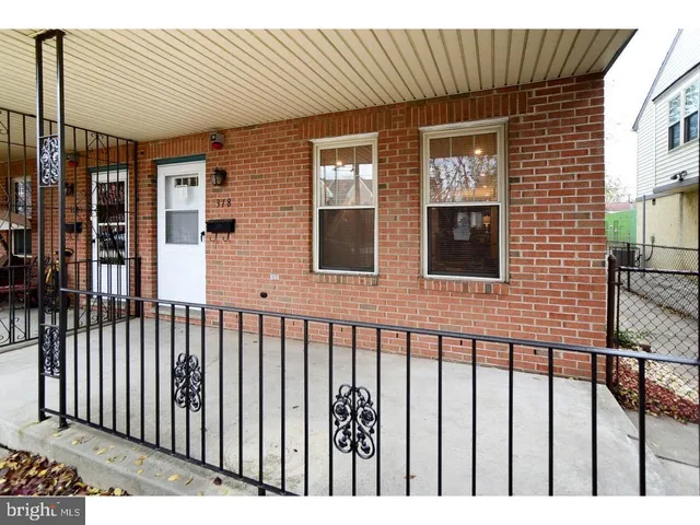 a front view of a house having yard