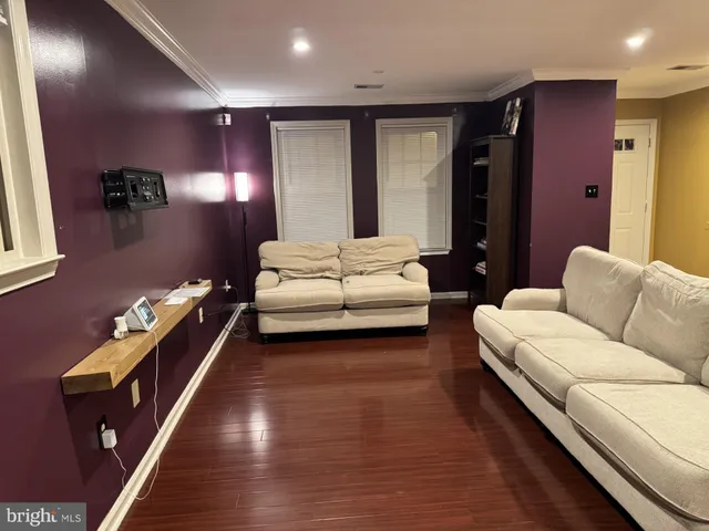 a living room with furniture and a couch