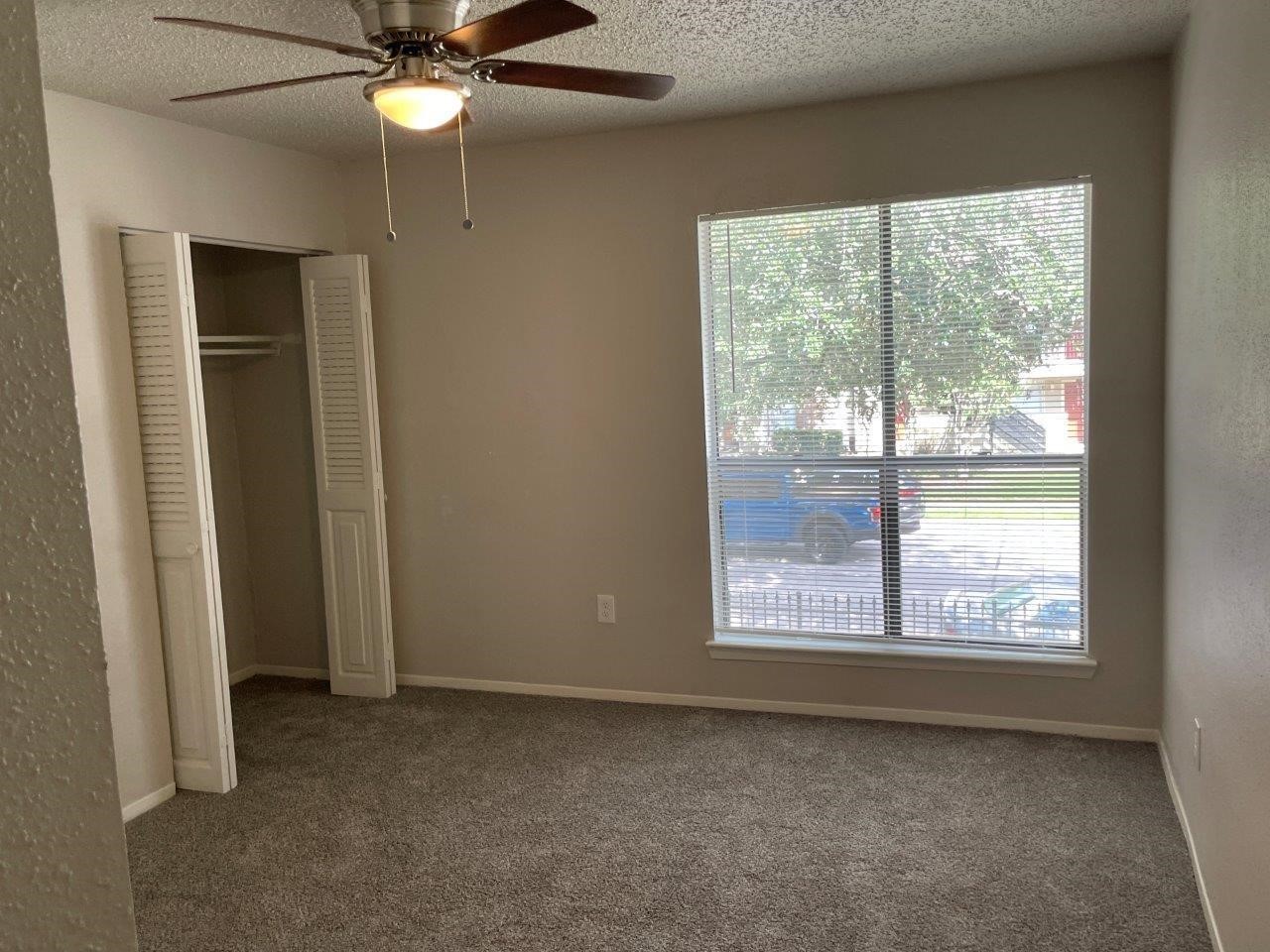 3608 Ocee Street Houston, TX 77063 - Photo 13 of 19 a view of an empty room with a window