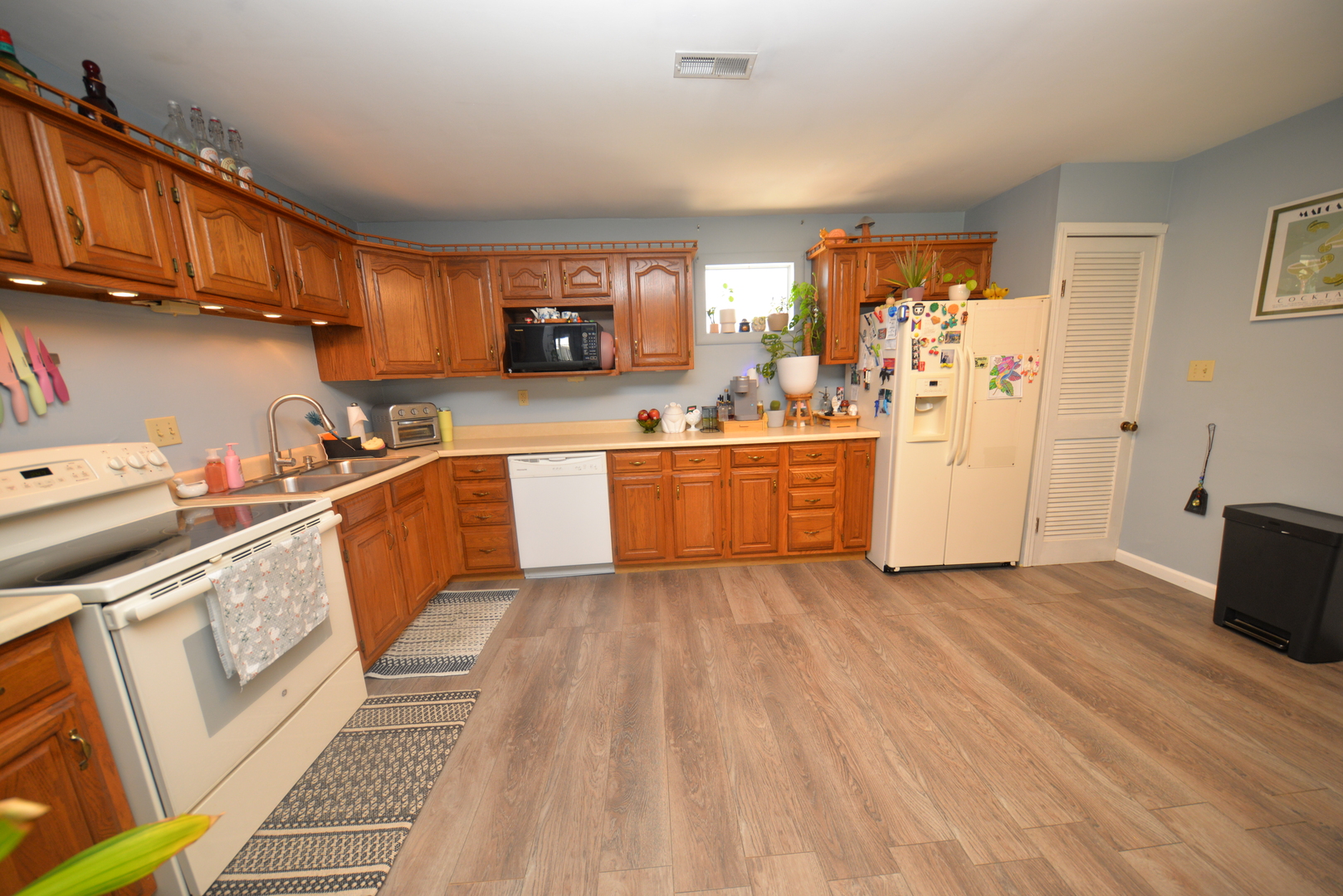 8 East Crownview Mount Vernon, IL 62864 - Photo 15 of 27 a kitchen with stainless steel appliances granite countertop a stove a sink and a refrigerator