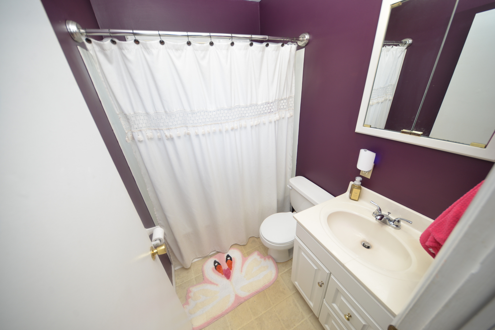 8 East Crownview Mount Vernon, IL 62864 - Photo 17 of 27 a bathroom with a sink a toilet and shower curtain
