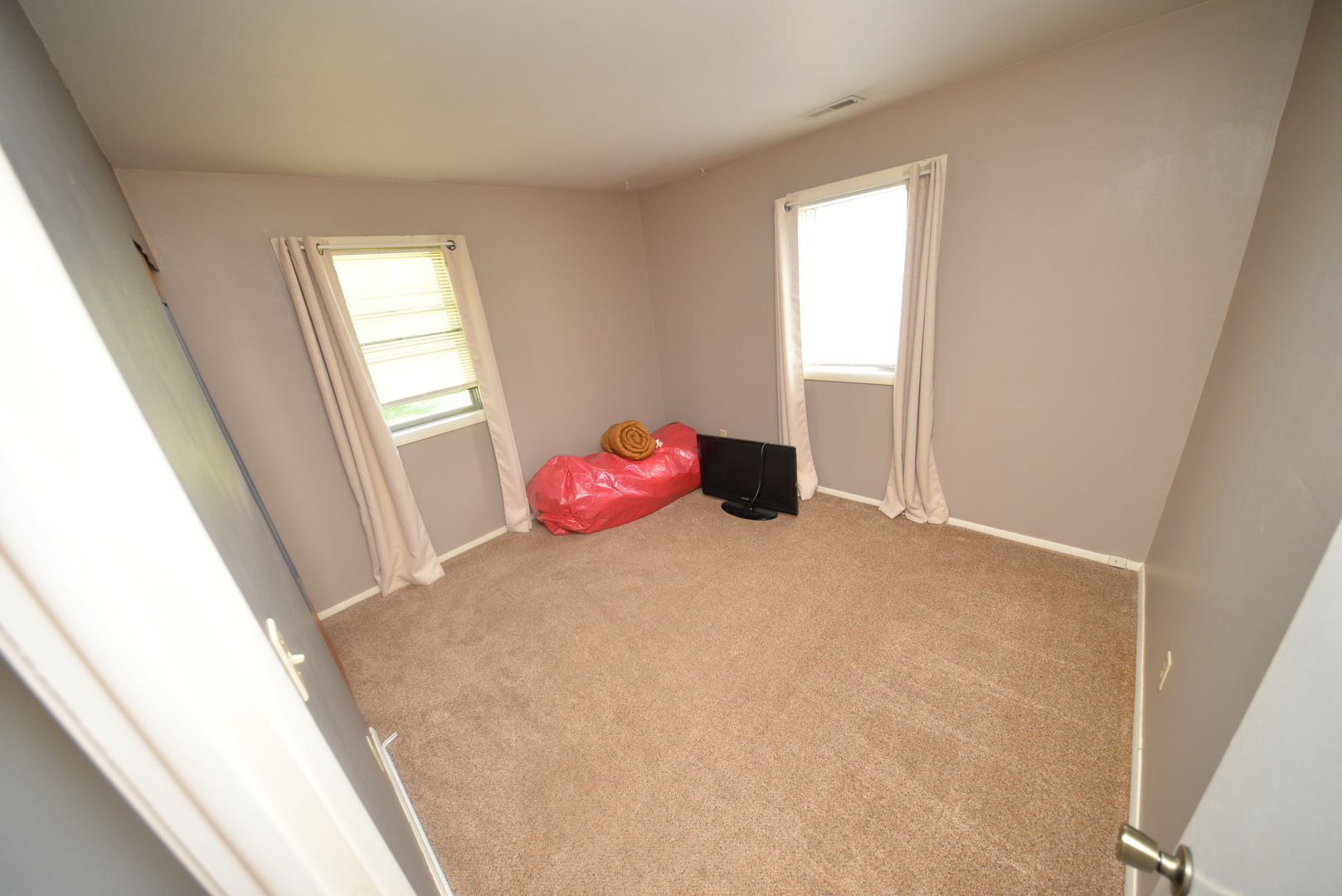8 East Crownview Mount Vernon, IL 62864 - Photo 23 of 27 a bedroom with a bed and a window