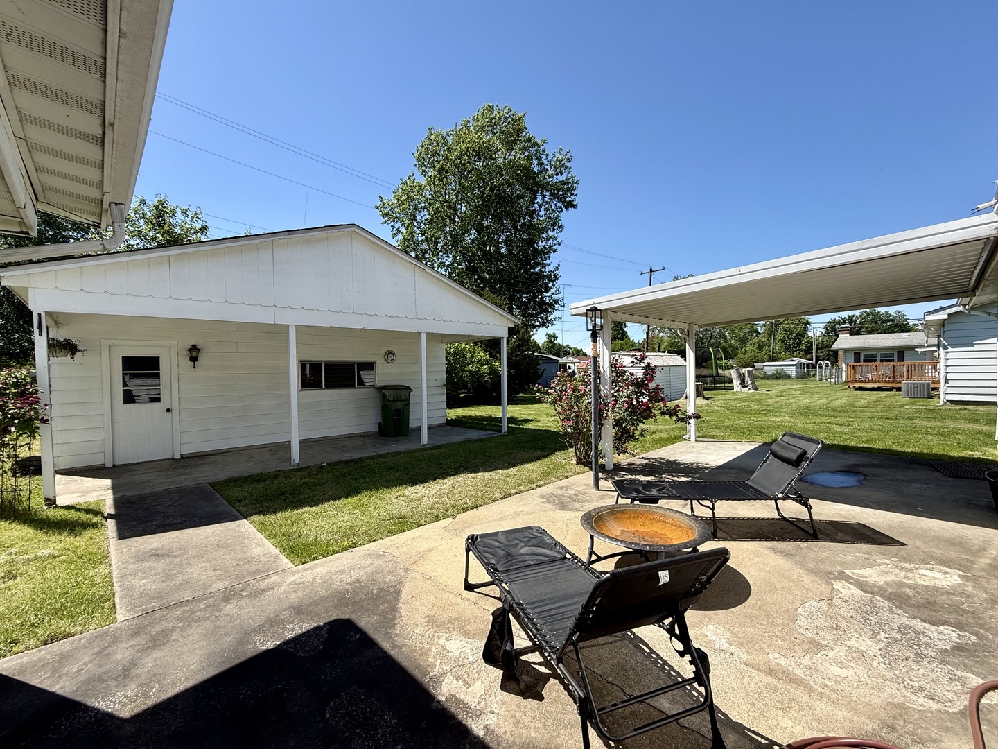 8 East Crownview Mount Vernon, IL 62864 - Photo 6 of 27 a view of a patio with couches chairs and potted plants