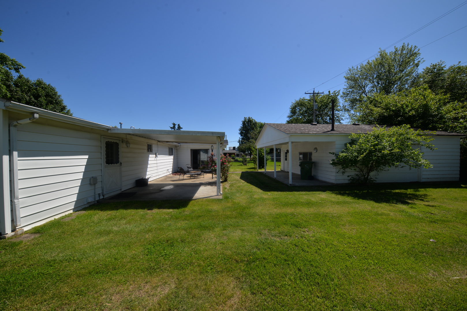 8 East Crownview Mount Vernon, IL 62864 - Photo 8 of 27 a front view of a house with a garden and yard