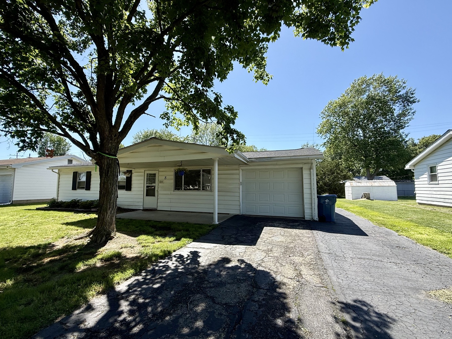 8 East Crownview Mount Vernon, IL 62864 - Photo 9 of 27 a front view of a house with a yard and garage