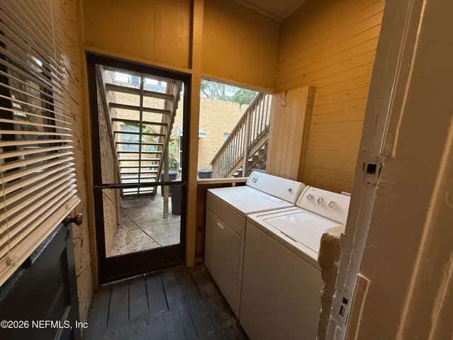 a utility room with dryer and washer
