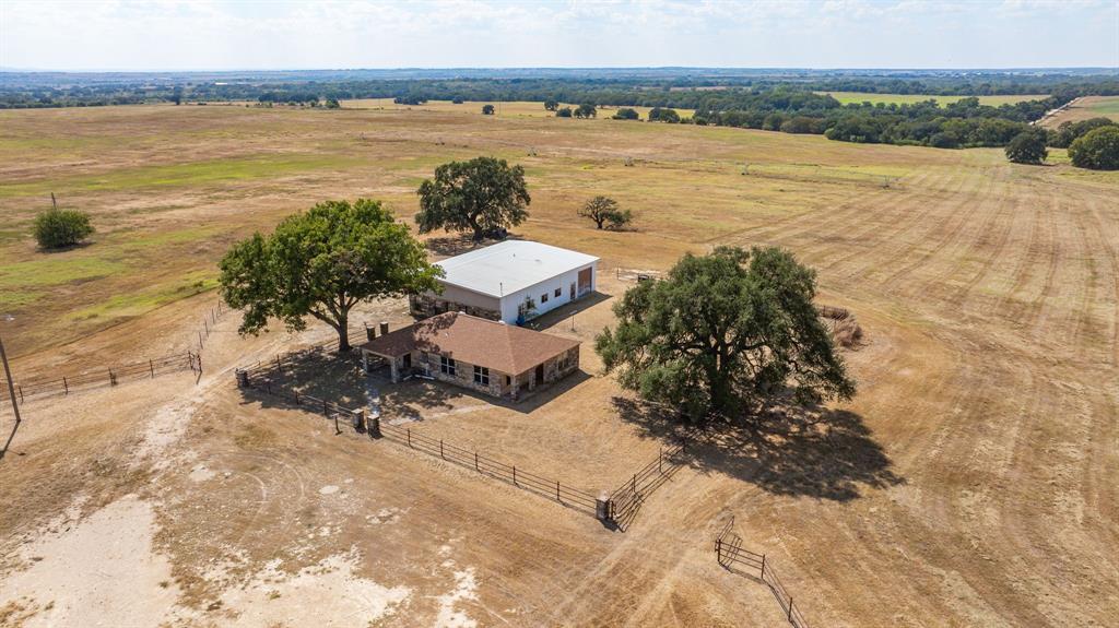 3066 County Road 285 Dublin, TX 76446 - Photo 2 of 40 a view of a lake with a mountain