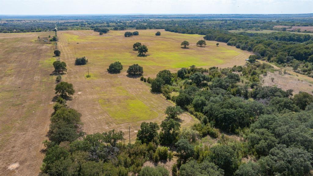 3066 County Road 285 Dublin, TX 76446 - Photo 33 of 40 a view of a swimming pool and lake view