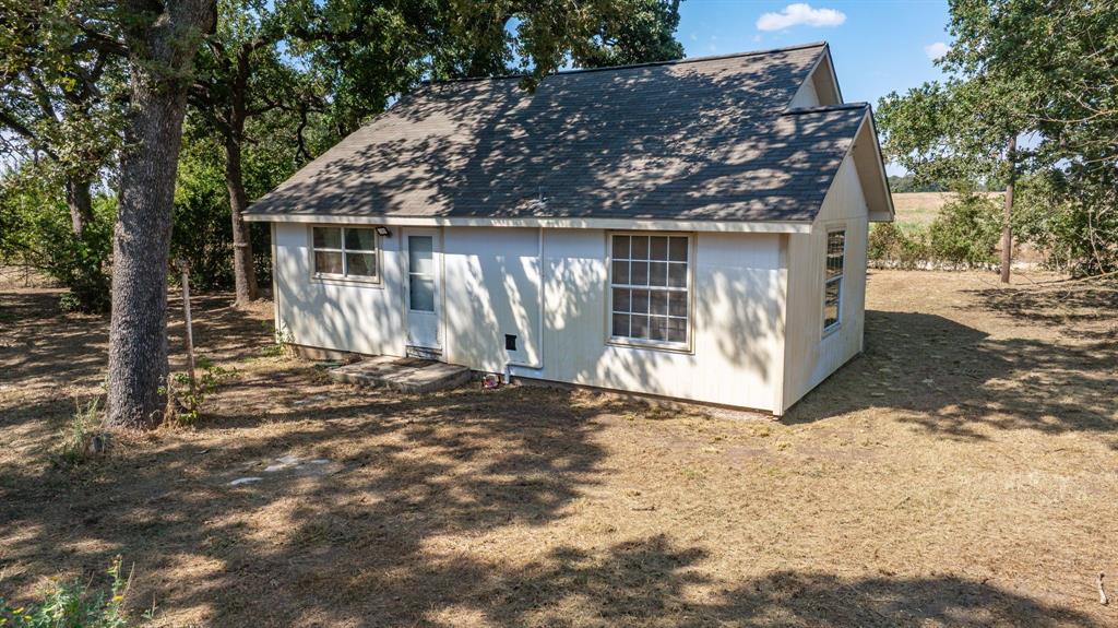 3066 County Road 285 Dublin, TX 76446 - Photo 35 of 40 a front view of house with yard