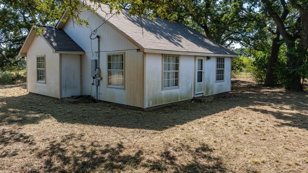 3066 County Road 285 Dublin, TX 76446 - Photo 36 of 40 a view of a house with a yard