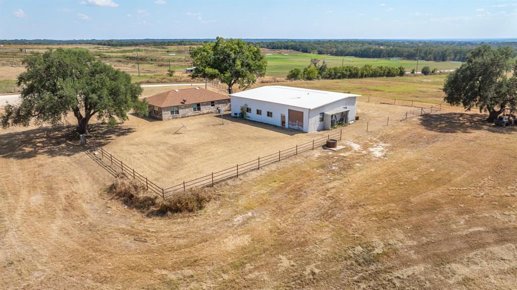 3066 County Road 285 Dublin, TX 76446 - Photo 4 of 40 a view of a lake with a mountain
