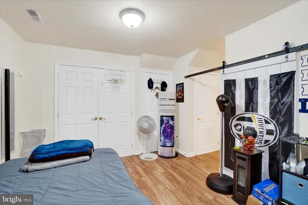 a view of room with gym equipment