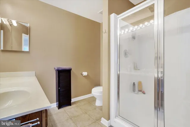 a bathroom with a sink and a toilet