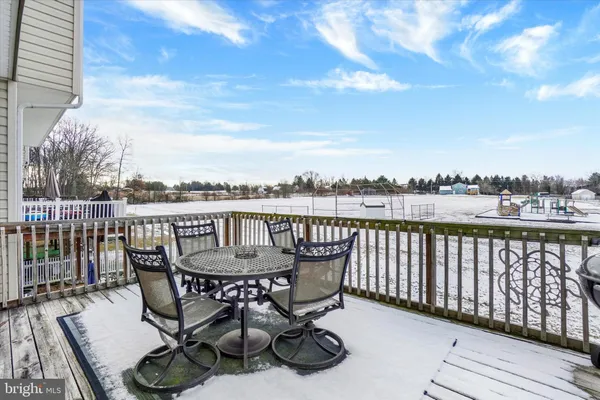 a view of balcony with furniture