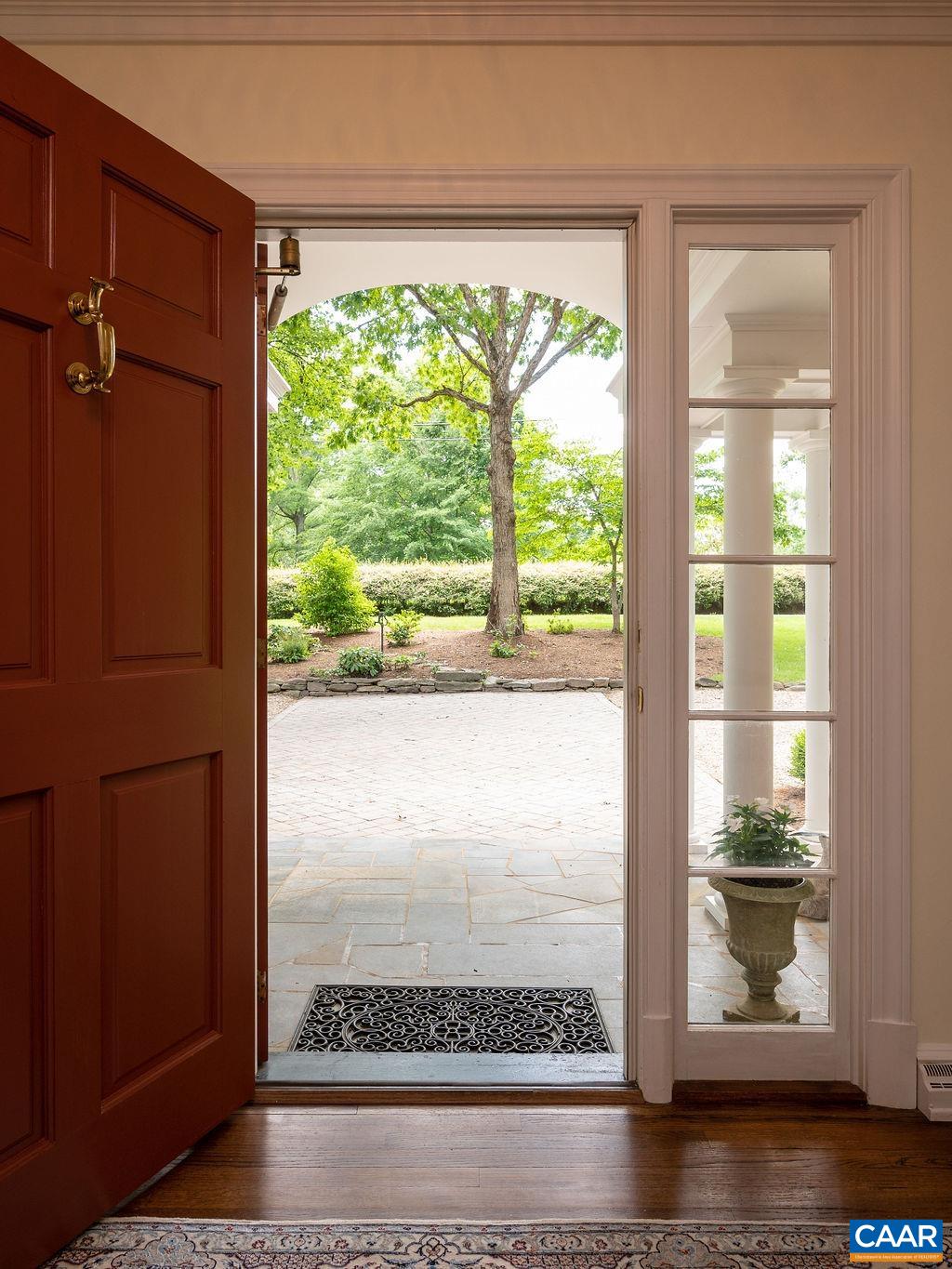 969 Tanglewood Road Charlottesville, VA 22901 - Photo 8 of 62 a view of a glass door and a window