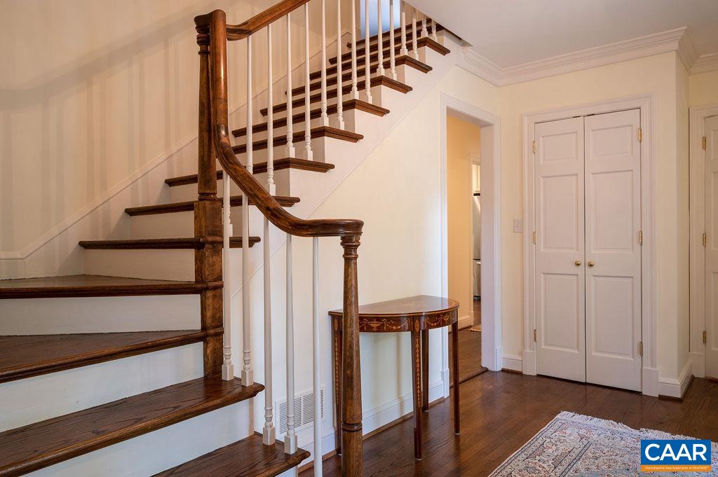 969 Tanglewood Road Charlottesville, VA 22901 - Photo 9 of 62 a view of entryway with wooden floor and stairs