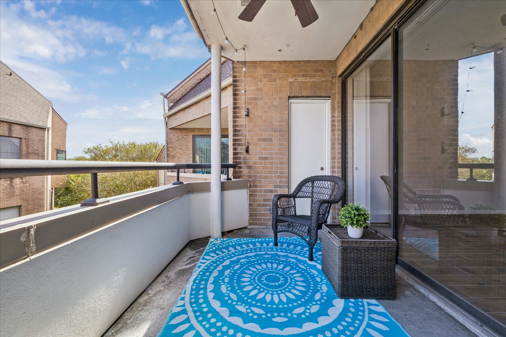 5210 Weslayan Street, Unit 303 Houston, TX 77005 - Photo 15 of 16 a living room with furniture and a table
