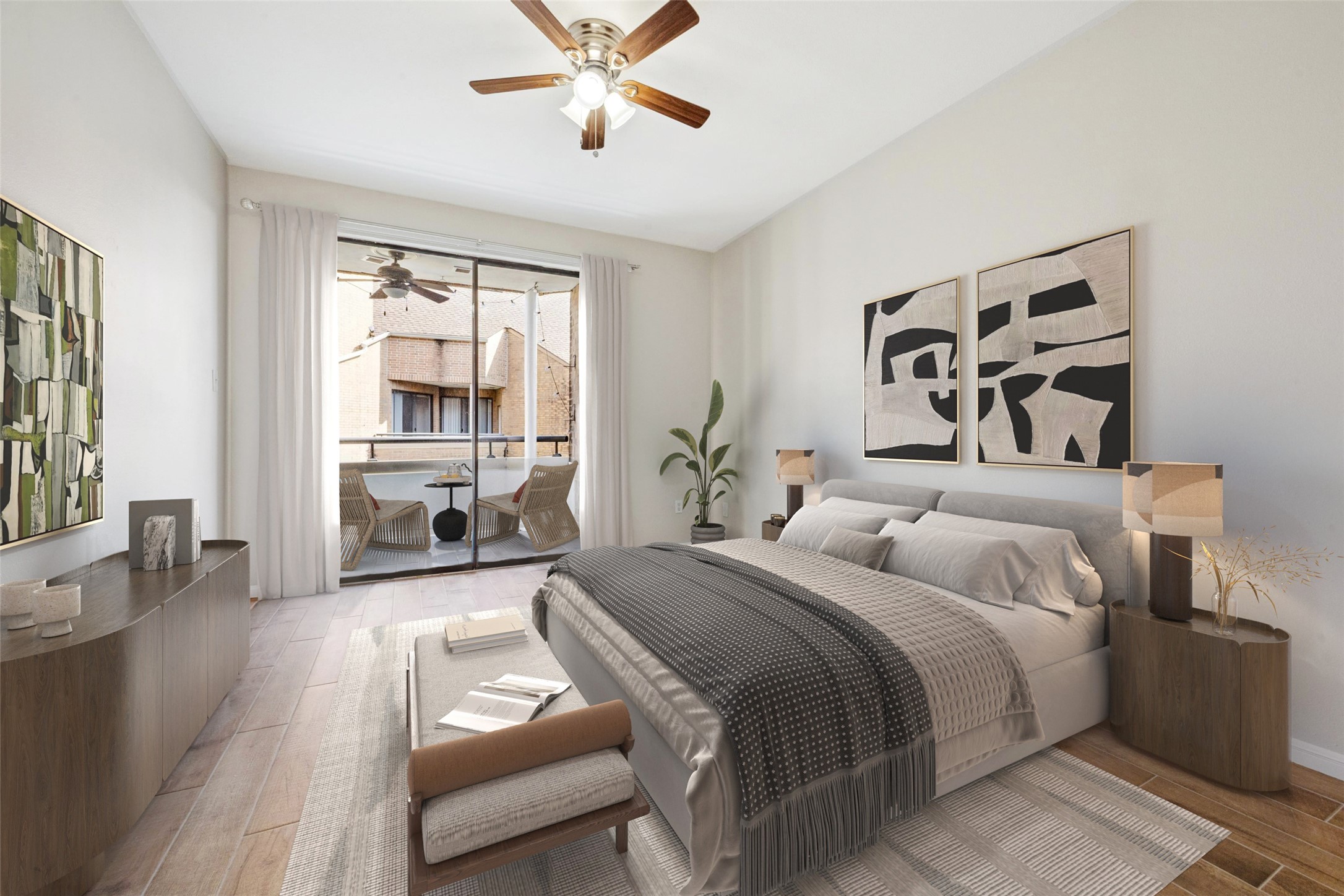 5210 Weslayan Street, Unit 303 Houston, TX 77005 - Photo 8 of 16 a bedroom with a bed and wooden floor