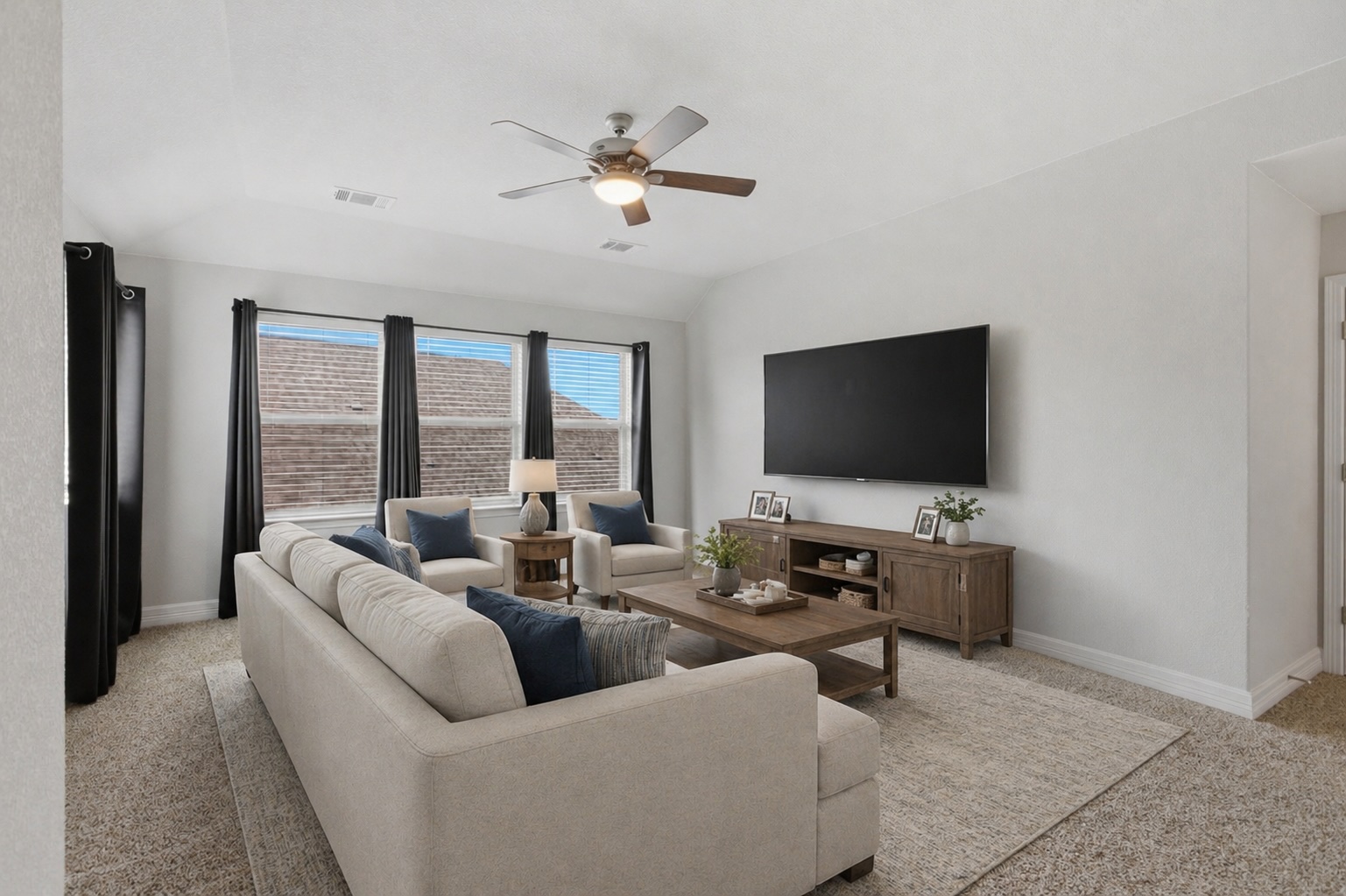 2009 Running Brushy Bend Leander, TX 78641 - Photo 20 of 32 a living room with furniture and a flat screen tv