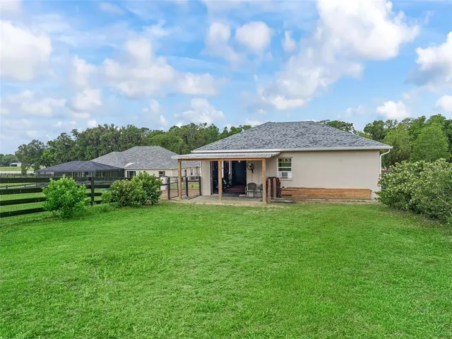 a view of a living room and dining room