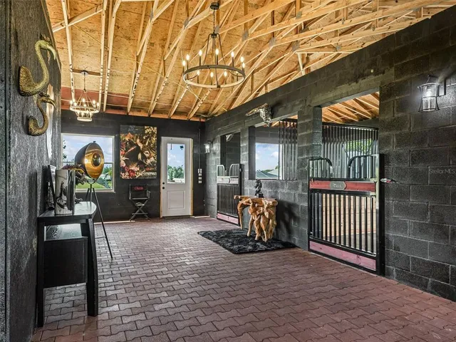 a view of a entryway door and dining room