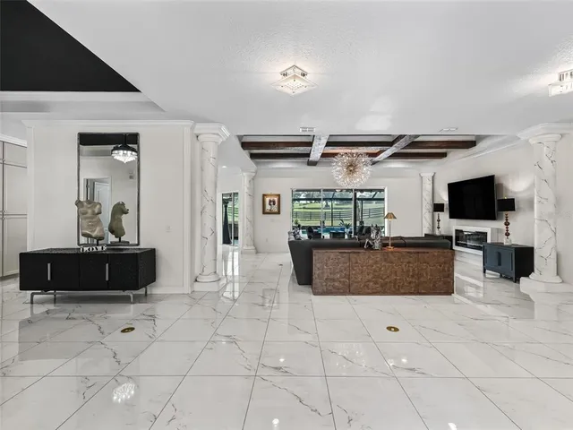 a kitchen with stainless steel appliances a sink and cabinets