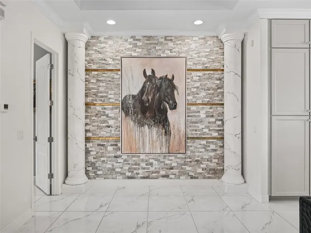 a spacious bathroom with a mirror and a sink